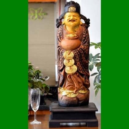 Thần tài ôm chum vàng
