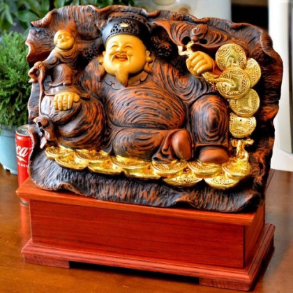 Thần tài ngồi xoài ung dung